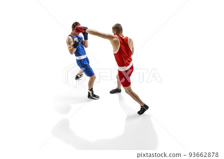 Fight. Professional male boxer in sports uniform and gloves training isolated on white background. Concept of sport, competition, training, energy Fight. Professional male boxer in sports uniform and gloves training isolated on white background. Concept of sport, competition, training, energy 93662878
