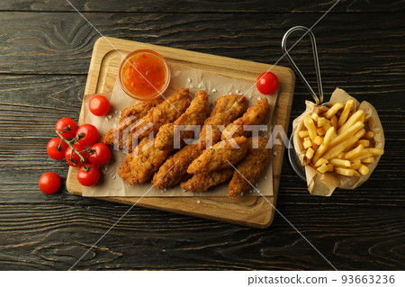 Concept of tasty food with Chicken strips, top view Concept of tasty food with Chicken strips, top view 93663236