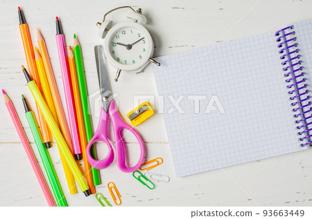 Children's accessories for study, creativity and office supplies on a white wooden background. Back to school concept. Copy space Children's accessories for study, creativity and office supplies on a white wooden background. Back to school concept. Copy space 93663449