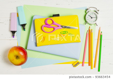 Children's accessories for study, creativity and office supplies on a white wooden background. Back to school concept Children's accessories for study, creativity and office supplies on a white wooden background. Back to school concept 93663454
