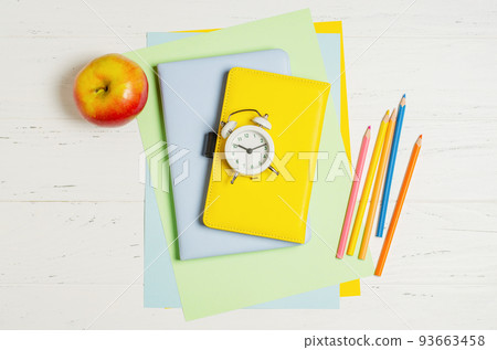 Children's accessories for study, creativity and office supplies on a white wooden background. Back to school concept 93663458