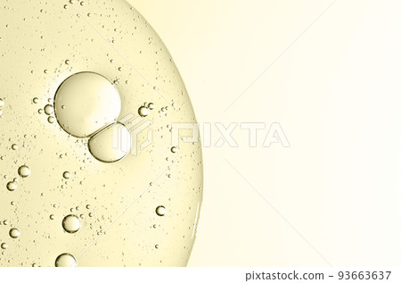 The texture of a cosmetic serum with bubbles in closeup. Macrophotography 93663637