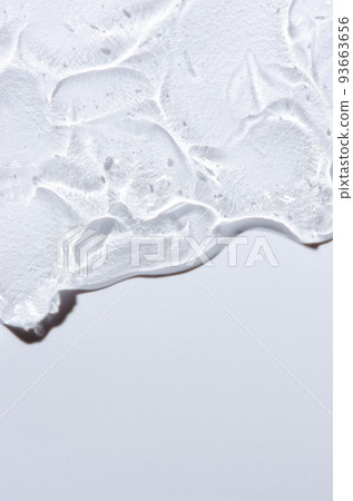 Transparent cosmetic texture. Skin serum or washing gel. Macrophotography. Copy space. 93663656
