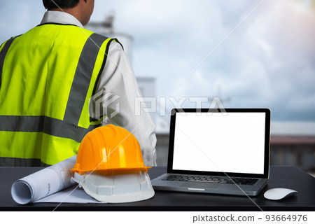 Profession concept with architect desk and tools on a wooden table. Profession concept with architect desk and tools on a wooden table. 93664976