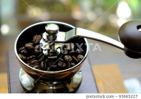 hand grinder and coffee beans hand grinder and coffee beans 93665227