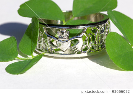 Claddagh ring. Traditional Irish ring in shape of two hands holding a heart shaped. Claddagh ring. Traditional Irish ring in shape of two hands holding a heart shaped. 93666052