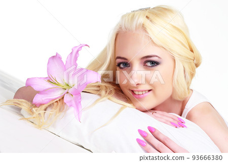 beauty portrait of a woman with a flower on white background 93666380