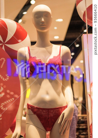 Display window with mannequins in shop. Sexy underwear on mannequin in retail. Female mannequins in the big mall. Display window with mannequins in shop. Sexy underwear on mannequin in retail. Female mannequins in the big mall. 93666410