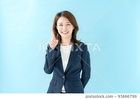 Business woman pointing blue back Business woman pointing blue back 93666799
