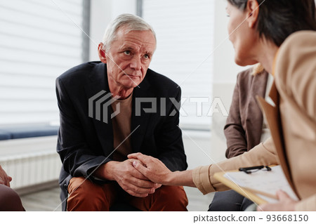 Senior man visiting psychotherapy class Senior man visiting psychotherapy class 93668150