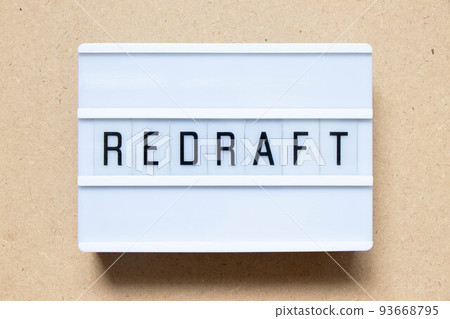 Lightbox with word redraft on wood background 93668795