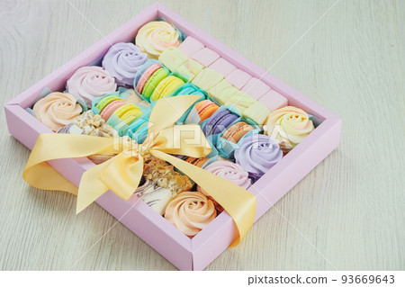 Traditional colored sweet desserts in box for the holiday, copy space. Desserts Traditional colored sweet desserts in box for the holiday, copy space. Desserts 93669643