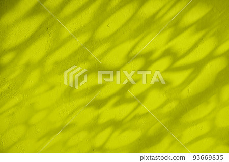 Shadow and light on solid yellow wall texture background 93669835