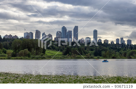 Deer Lake with Modern City Building Skyline in background Deer Lake with Modern City Building Skyline in background 93671119