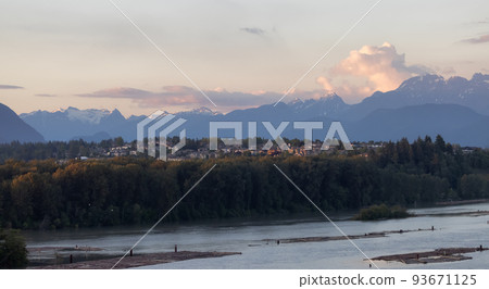 Residential Homes in a modern city with mountain peaks in background. Residential Homes in a modern city with mountain peaks in background. 93671125