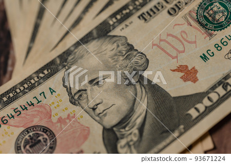 Gold ingot Gold and dollar bills Gold ingot Gold and dollar bills 93671224