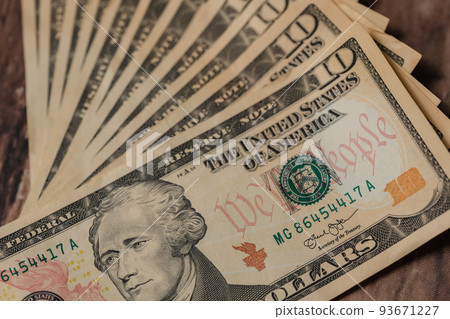 Gold ingot Gold and dollar bills Gold ingot Gold and dollar bills 93671227