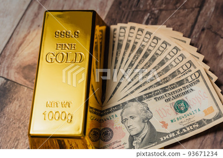 Gold ingot Gold and dollar bills 93671234