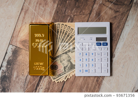 Gold ingot Gold and dollar bills Calculator 93671356