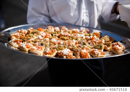 Street food at the wedding or another catered event dinner 93671518