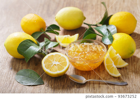 bowl of lemon's jam with fresh fruits 93673252