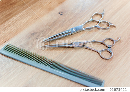 Hairdresser's scissors and comb, scissors and comb 93673421