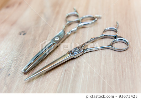 Hairdresser's scissors and comb, scissors and comb 93673423