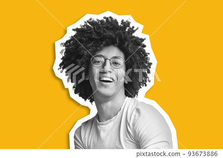 Cool african american guy with bushy hair over yellow background 93673886