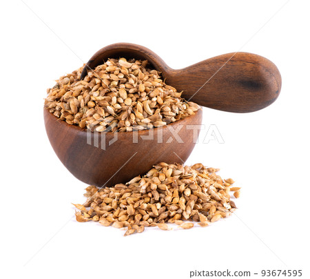 Utsho suneli seeds in wooden bowl and spoon, isolated on white background. Trigonella caerulea or blue fenugreek. 93674595