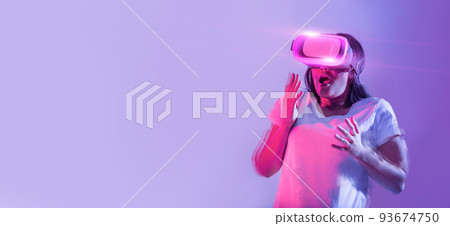 Getting to know digital world. Frightened woman in virtual glasses 93674750