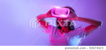 Surprised millennial lady in virtual reality glasses 93674823