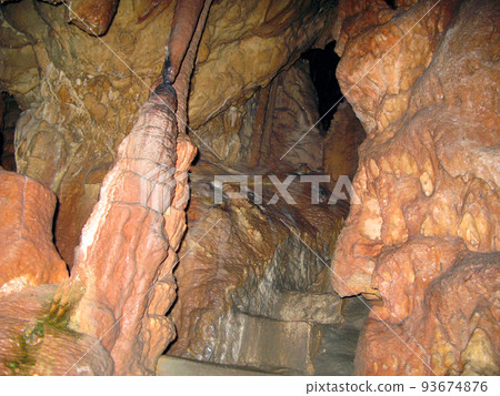 Ancient karst cave with stalactites and stalagmites, Petralona cave Greece Cenote ceiling and limestone decoration. Ancient karst cave with stalactites and stalagmites, Petralona cave Greece Cenote ceiling and limestone decoration. 93674876