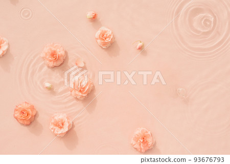 Water beauty background. Natural pattern with pink roses on surface of transparent water close-up 93676793