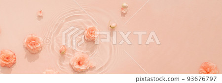Water beauty background. Natural pattern with pink roses on surface of transparent water close-up 93676797