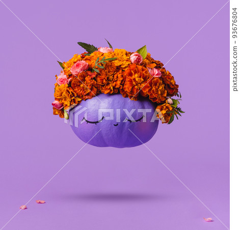 Positive Purple Halloween pumpkin with flowers, wreath and make-up, levitate 93676804