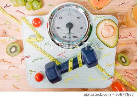 Fitness with dumbbell and genuine food with fresh fruit 93677653