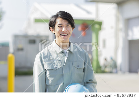 A young man working on clothes 93678937