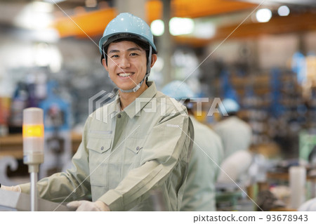 A young man working on clothes A young man working on clothes 93678943