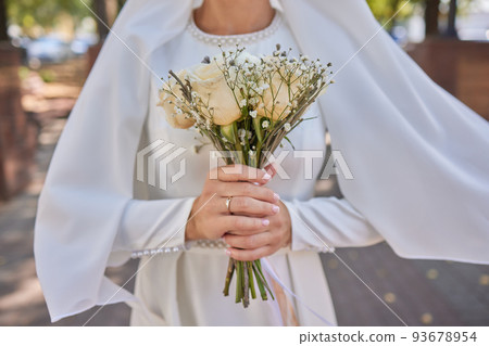 Bride and groom Asian Muslims marry in a beautiful red love theme. celebration nikah day. Bride and groom Asian Muslims marry in a beautiful red love theme. celebration nikah day. 93678954