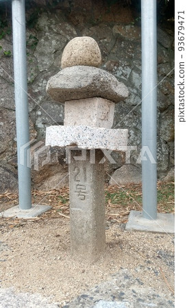 A rare stone pillar seen in the city A rare stone pillar seen in the city 93679471