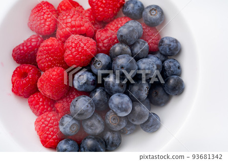 Raspberry and blueberries Raspberry and blueberries 93681342