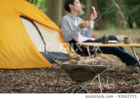 Men enjoying solo camp Men enjoying solo camp 93682555