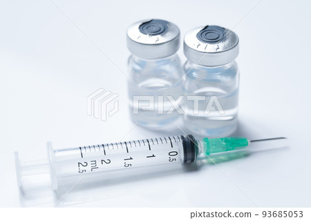 Syringe and vial placed on white background 93685053