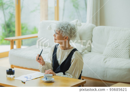 Woman writing a letter 93685621