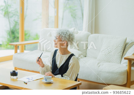 Woman writing a letter 93685622