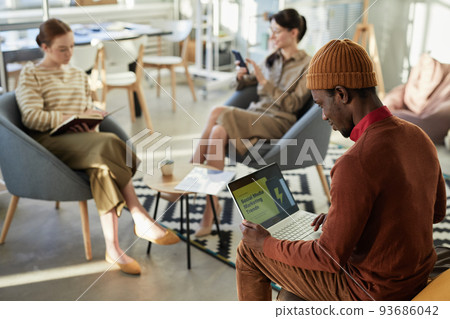 Black Young Man Doing Marketing Research 93686042