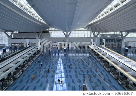 Departure terminal and counters inside an international airport in Japan Departure terminal and counters inside an international airport in Japan 93686367