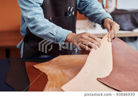 Artisan Choosing Leather 93686930