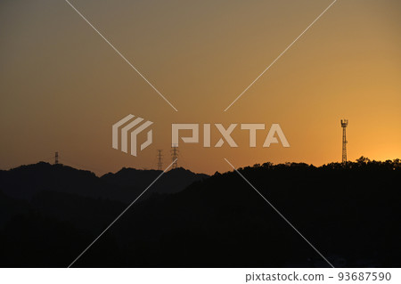 Sunset over the mountains and radio tower Sunset over the mountains and radio tower 93687590