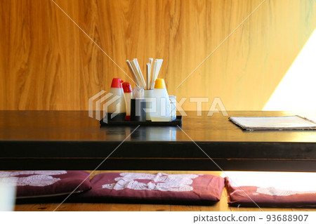 The nostalgic scenery of an old-fashioned restaurant with seasonings on the table 93688907
